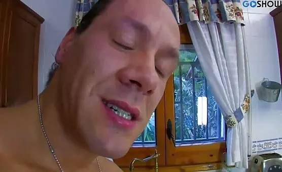 Brunette with long hair indulges in kitchen anal